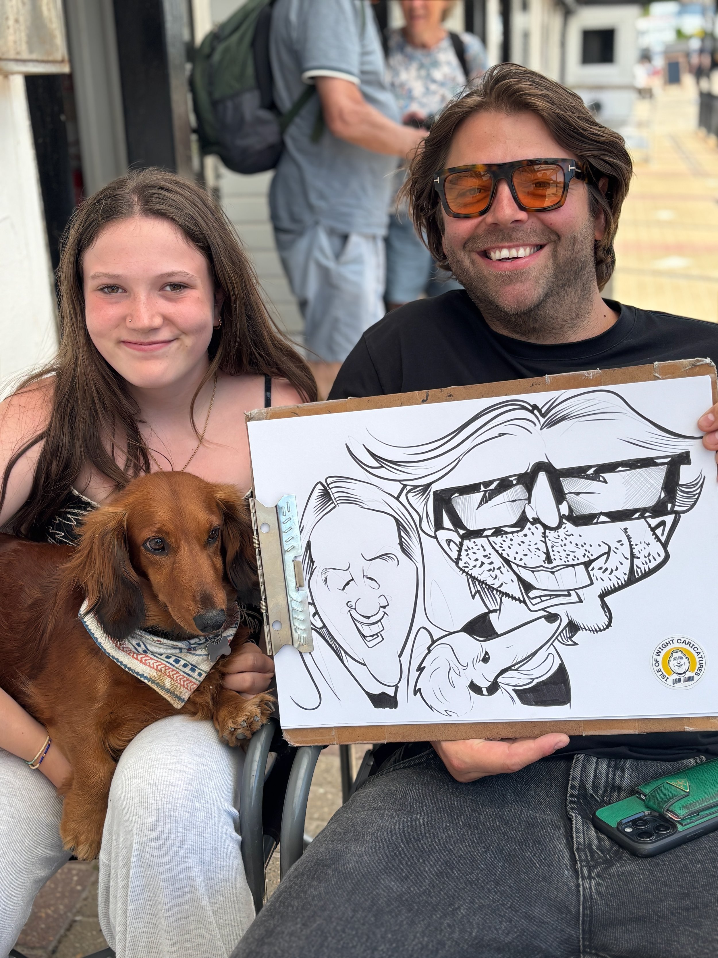 Live caricature artist drawing guests at a wedding, Isle of Wight