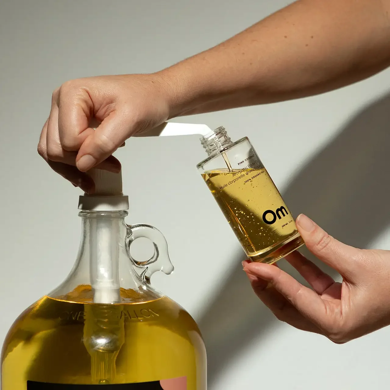 om-pink-coconut-body-oil-refill-brees-brow-lounge-and-beauty-bar-chilliwack-3.webp