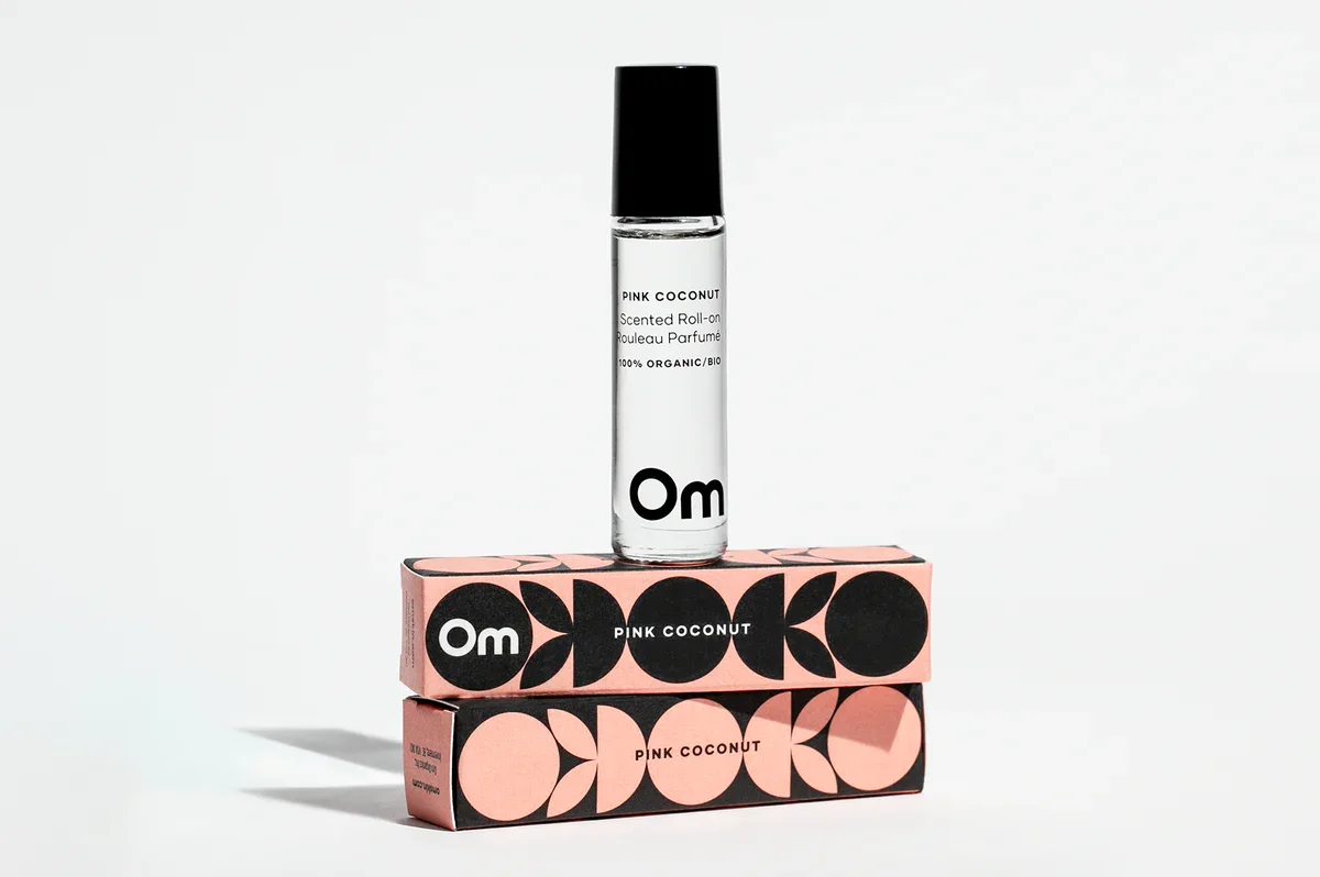 om-pink-coconut-scented-roll-on-brees-brow-lounge-4.webp