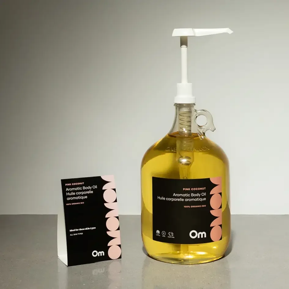 om-pink-coconut-body-oil-refill-brees-brow-lounge-and-beauty-bar-chilliwack.webp