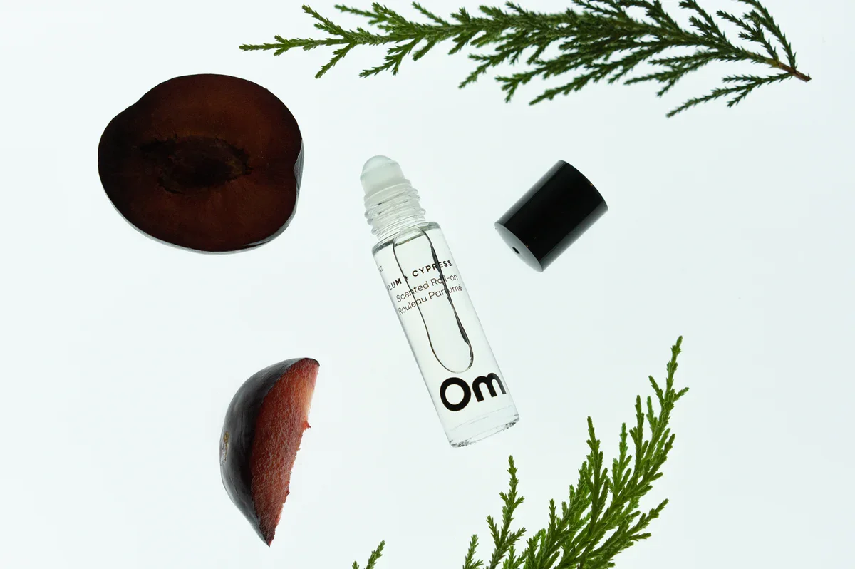 om-wild-plum-cypress-scented-roll-on-brees-brow-lounge-chilliwack-2.webp