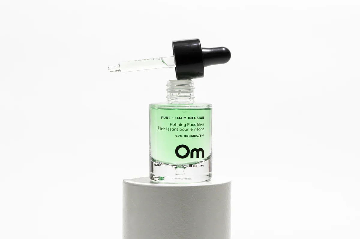 om-pure-calm-infusion-refining-face-elixir-brees-brow-lounge-chilliwack.webp