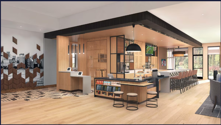 Modern restaurant interior with a central bar area featuring bar stools, a black pendant light, and a decorative glass partition. Wooden accents and murals of a city skyline are visible.