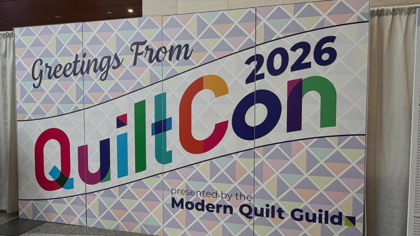 Quiltcon 2026 is about to begin!
Join us Friday or Saturday for a group photo at 12:30 at our community quilt (ballroom A)