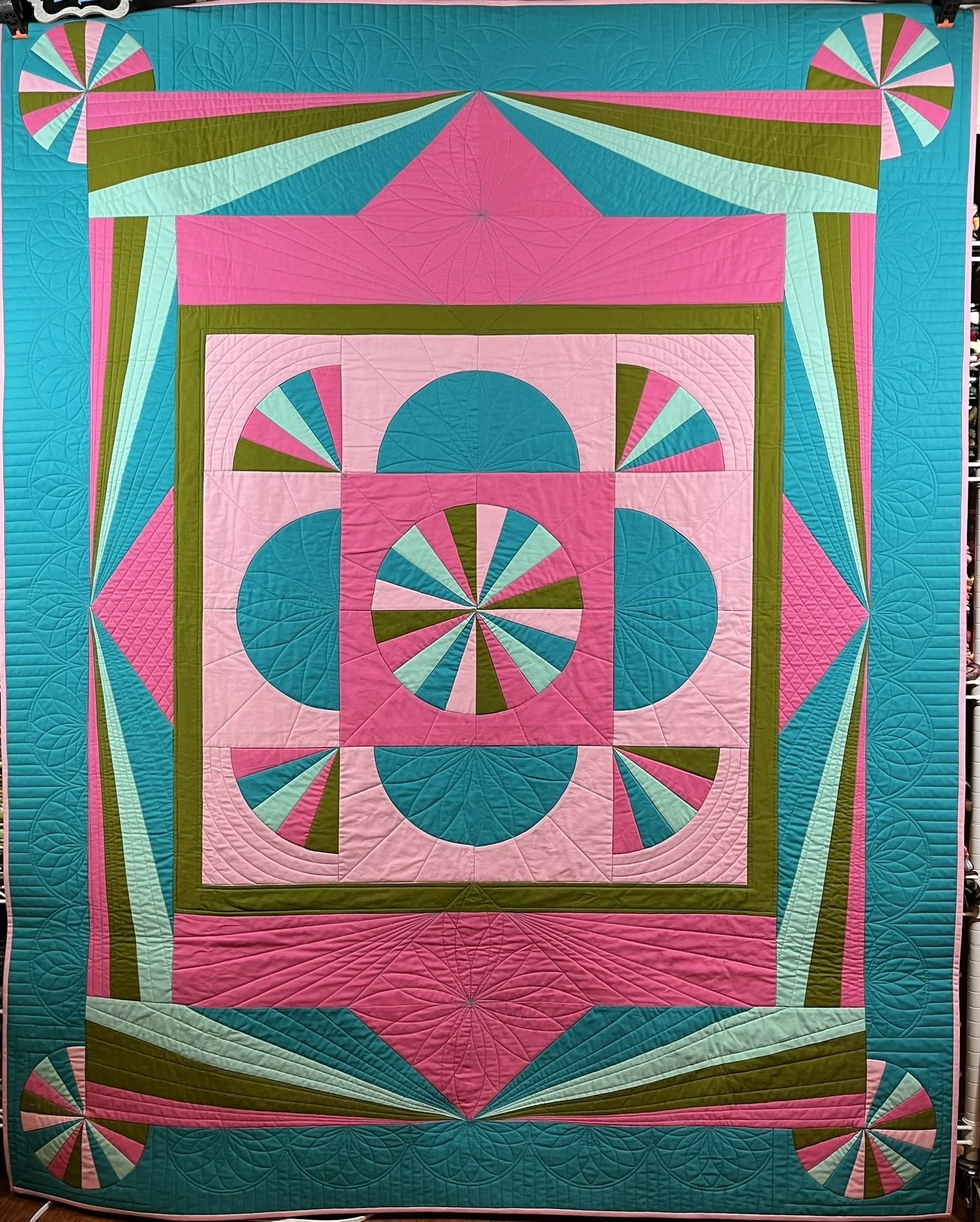 Spinning Wheels, CLTMQG 2026 entry into the Quiltcon Community Quilts Challenge