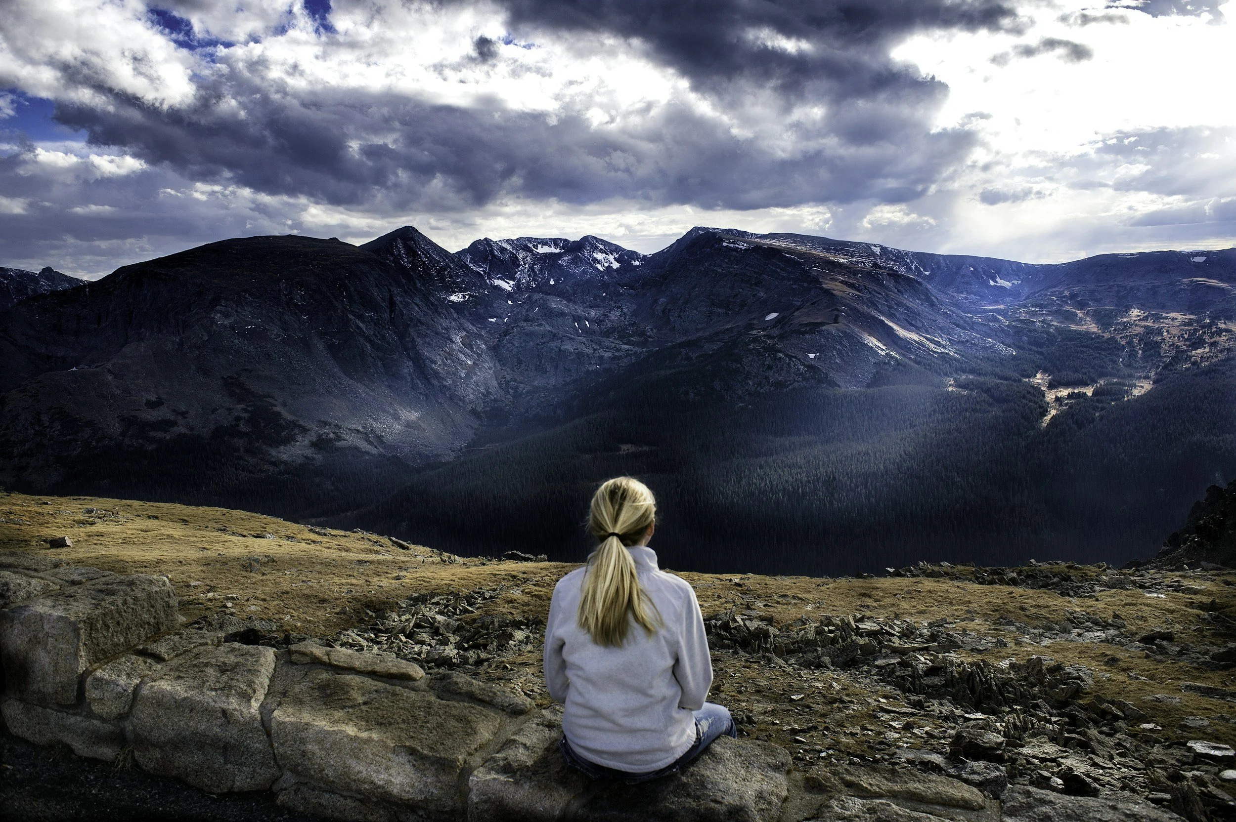 peaceful woman on mountain