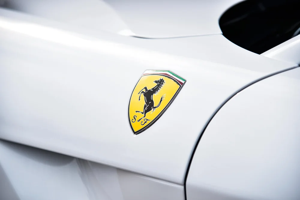 White Ferrari shield emblem detail