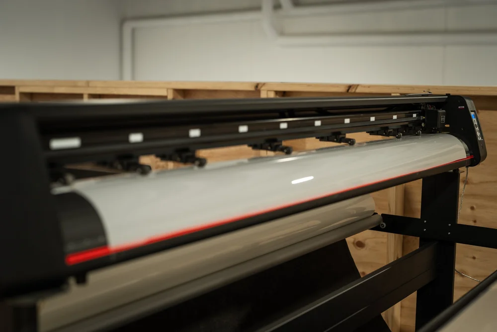 Large format printer in an automotive wrap workshop