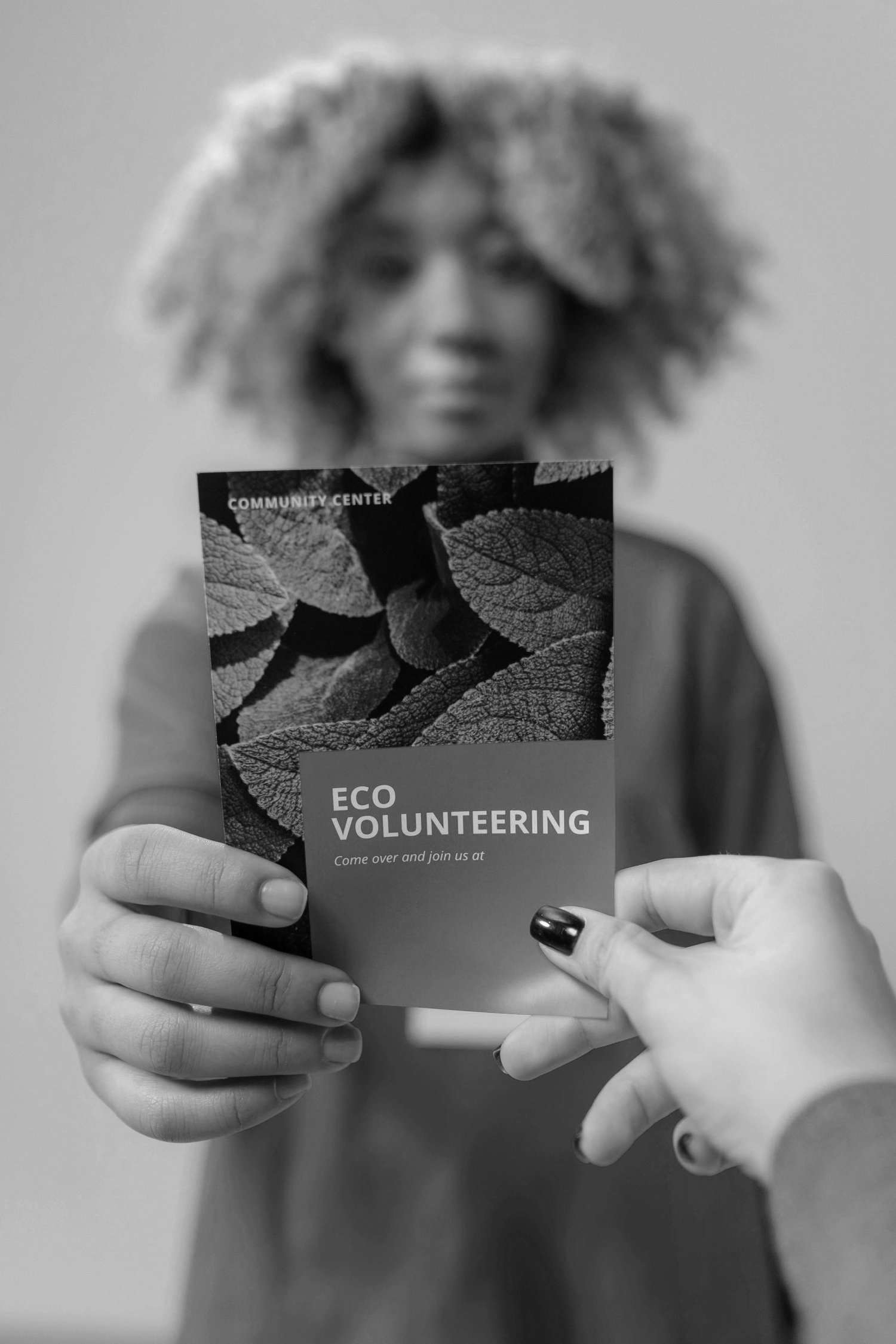 Promotional worker presenting printed campaign material