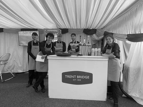 Hospitality team working behind a bar at Trent Bridge