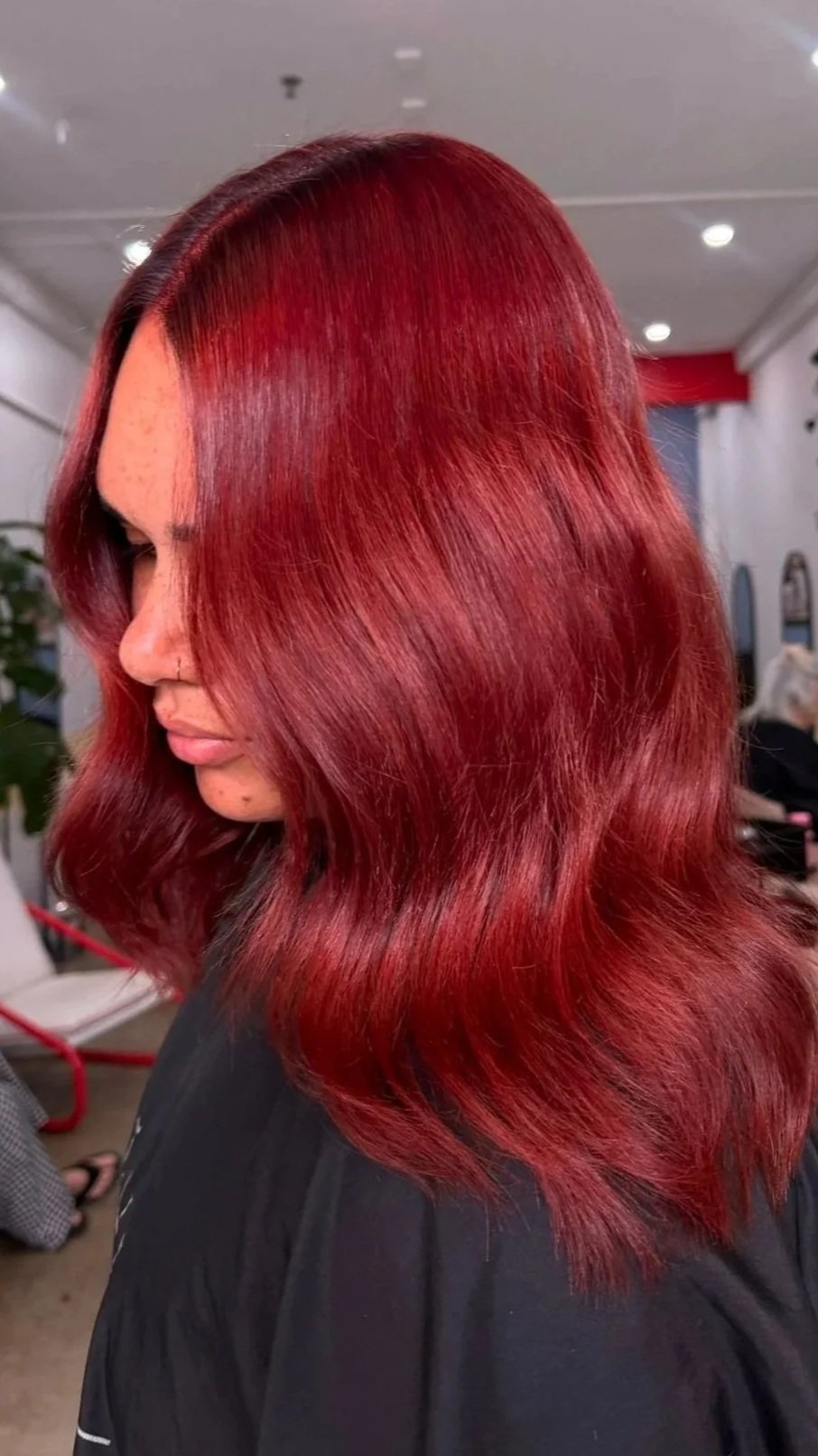 wavy hair styled with straightener. Red hair.  Brisbane hair salon. Kevin Murphy.