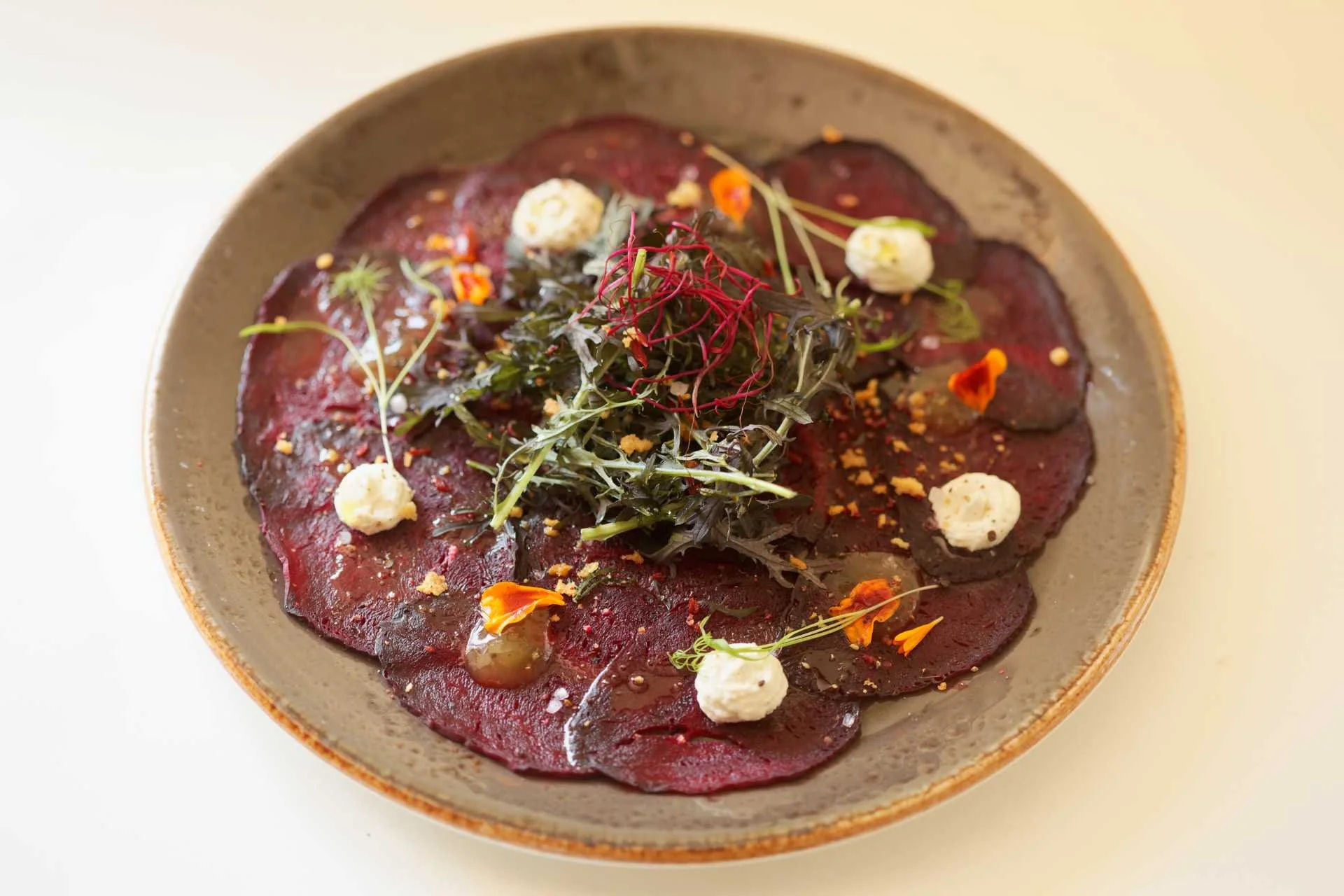 2025-05 Bieten carpaccio sit down.jpg