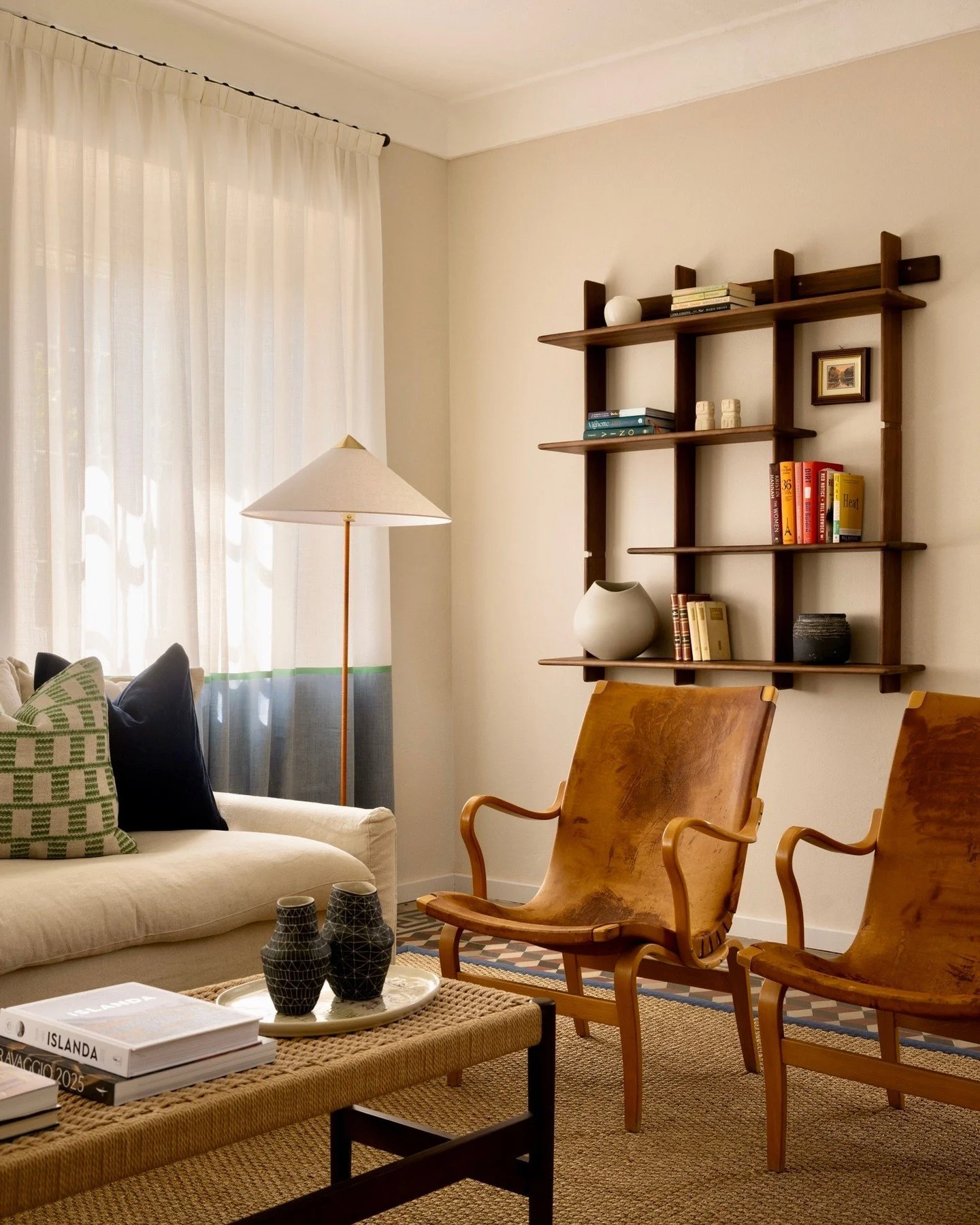 A living room detail from our Monferrato project &mdash; a house that asked to remain entirely itself. A 19th-century Piedmontese villa, where we preserved its bones while opening it up to light and to the way the family lives. Vintage pieces sit alo