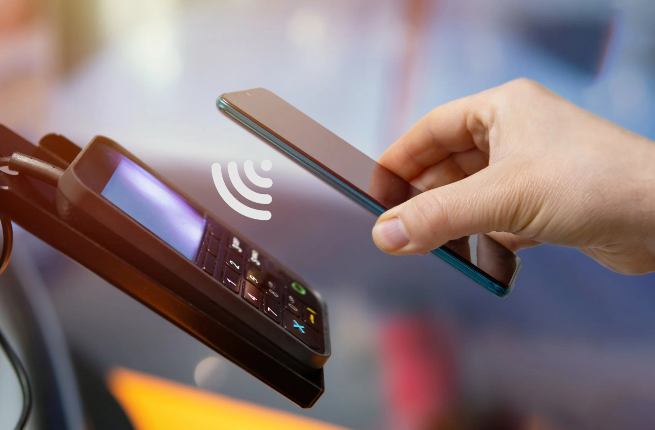 Android smart POS terminal displaying custom payment application and TMS software interface.