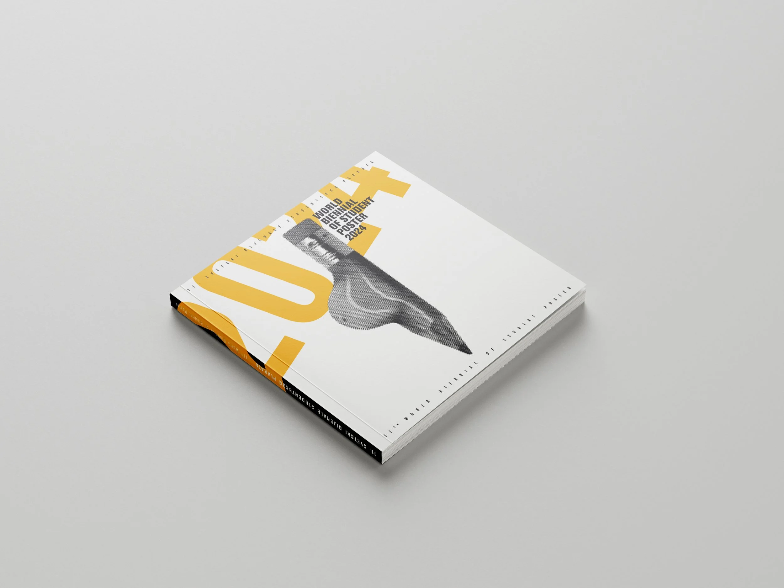 World Biennial Exhibition of Student Poster 2024 book on a light background.