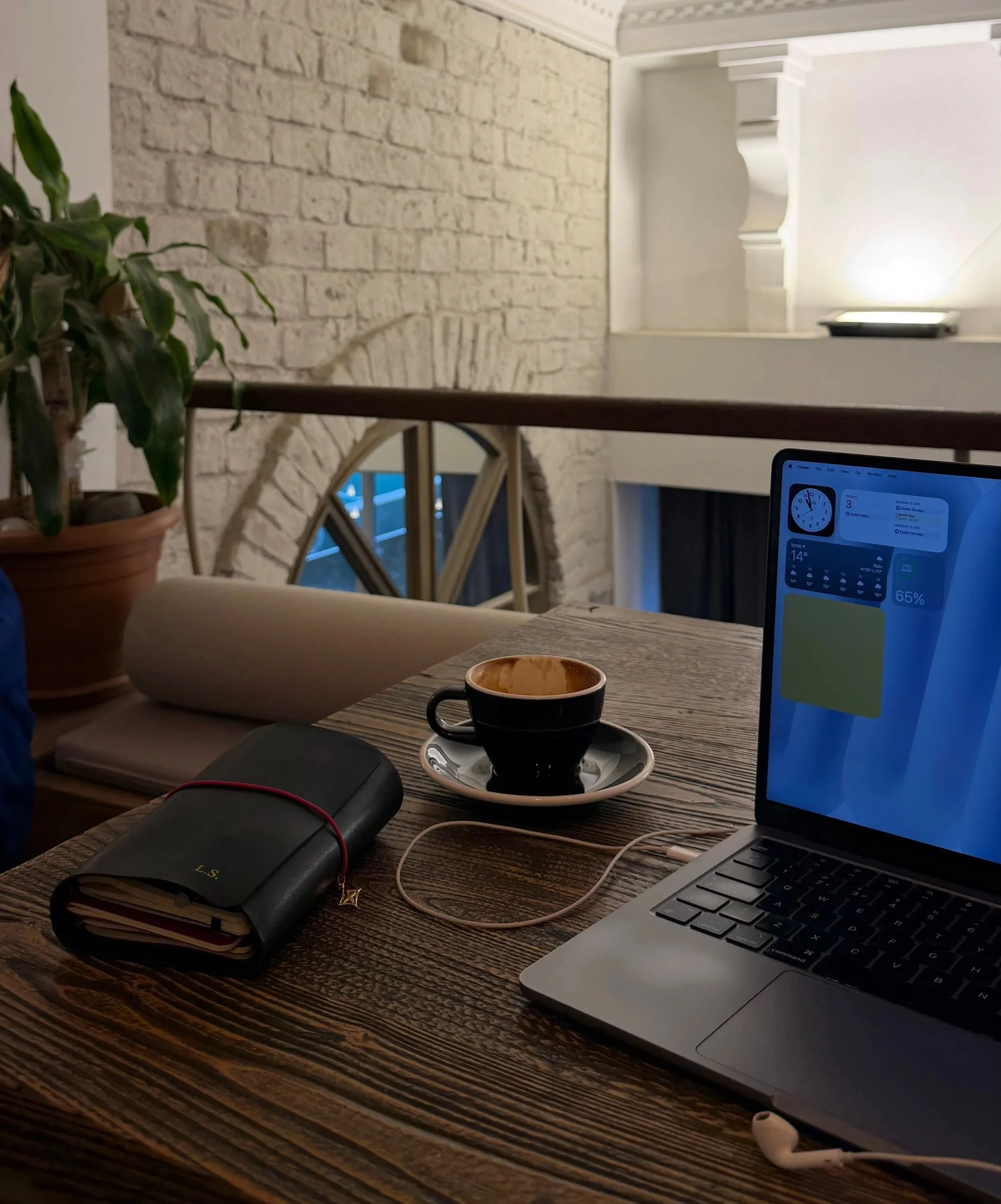 laptop in a coffee shop ai