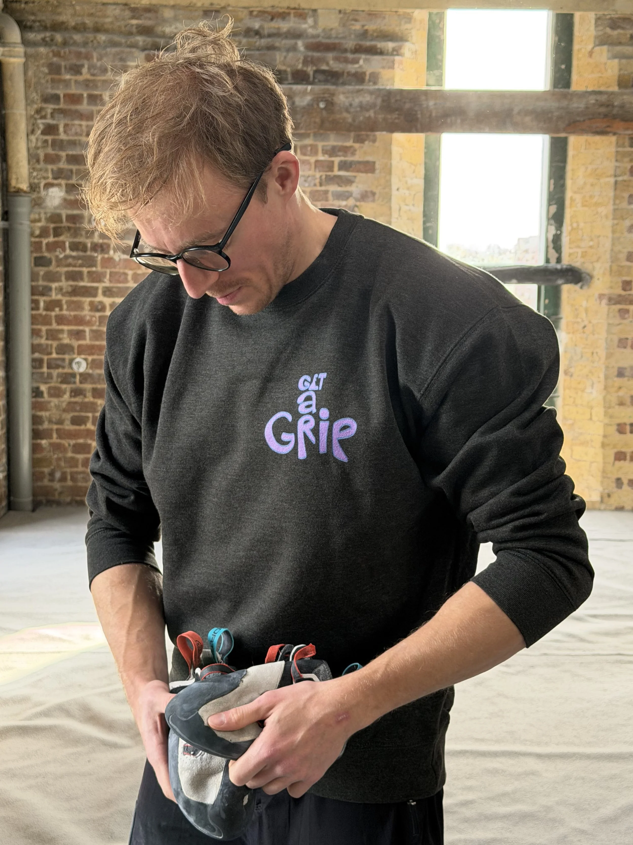 Get a Grip Sweatshirt (Blue Hands Design)