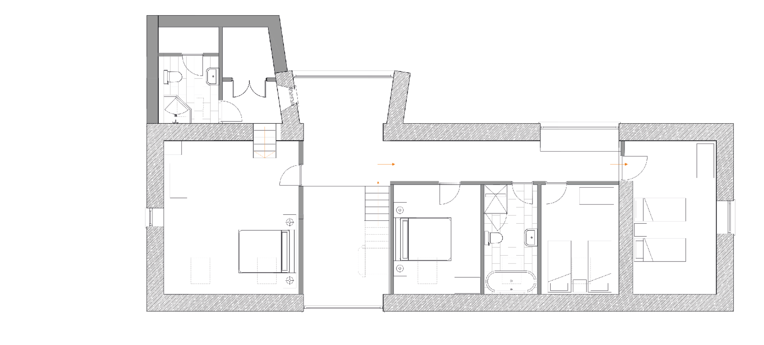 Floor plan of a residential house showing multiple rooms including bedrooms, bathrooms, and hallways.