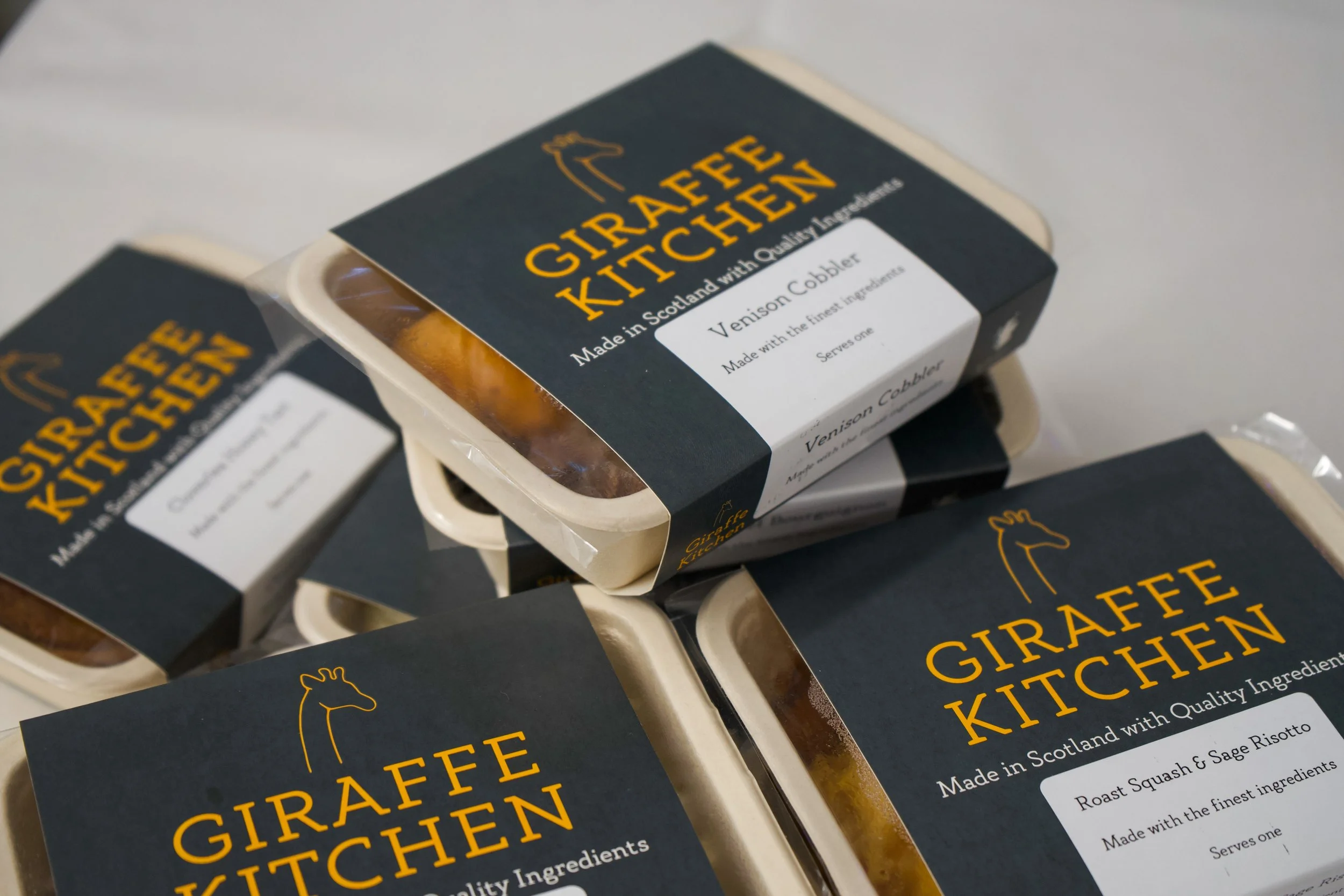 A selection of packaged Giraffe Kitchen gourmet ready meals