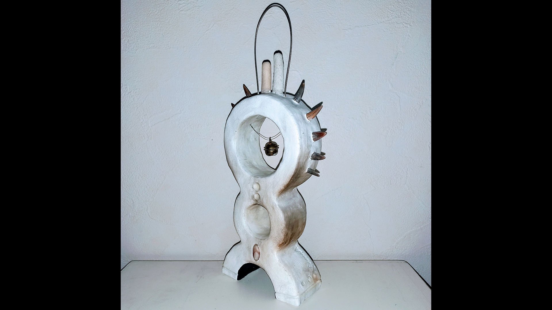 Anna Gabriele
WÆCHTER
JP 2024
___
series sculpture
clay, shark teeth, coral, shells, japanese temple bell, guitar string, luminous pigment, gouache, acrylic varnish
size tallest H:27cm W:13cm D:4cm
size smallest H:8,5cm W:5cm D:1cm