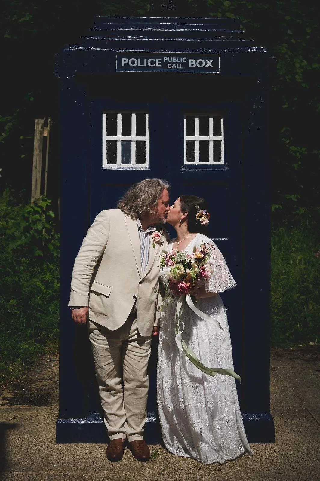 Image by Nick Brightman Photography at Avoncroft Museum - A bride and groom in front of a police call box