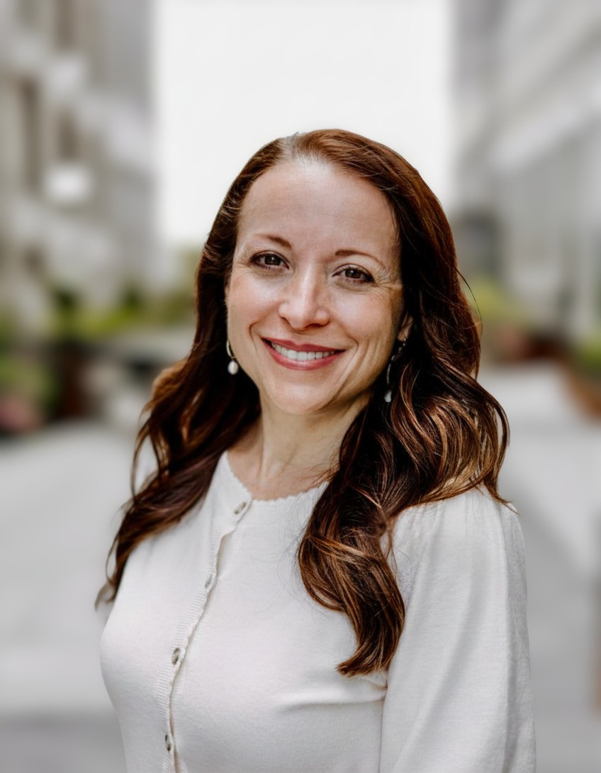 Jenny Wiggins, ALC, smiling in a professional therapist headshot for Evergreen Therapy in Huntsville, Alabama