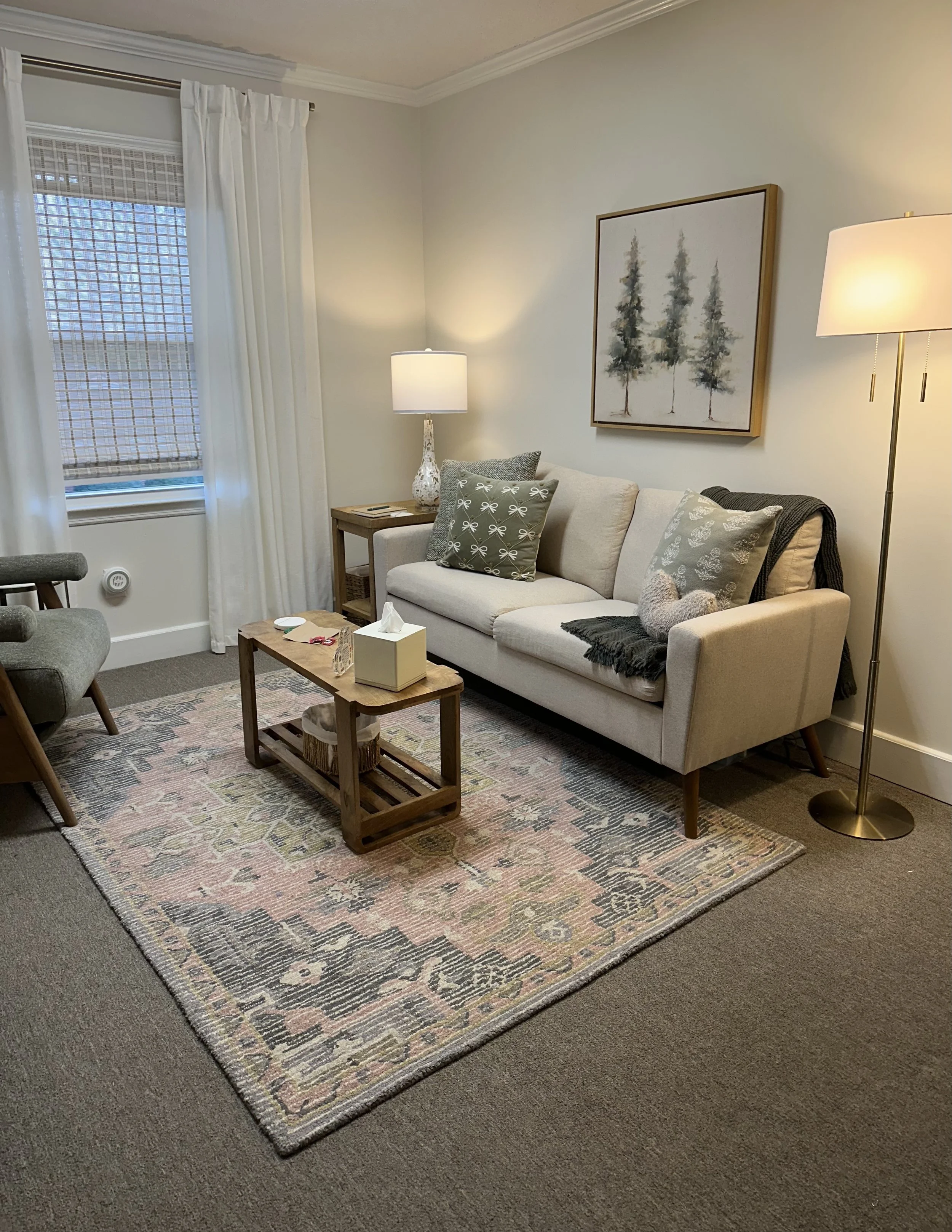 Cozy therapy office with comfortable couch at Evergreen Therapy in Huntsville, Alabama