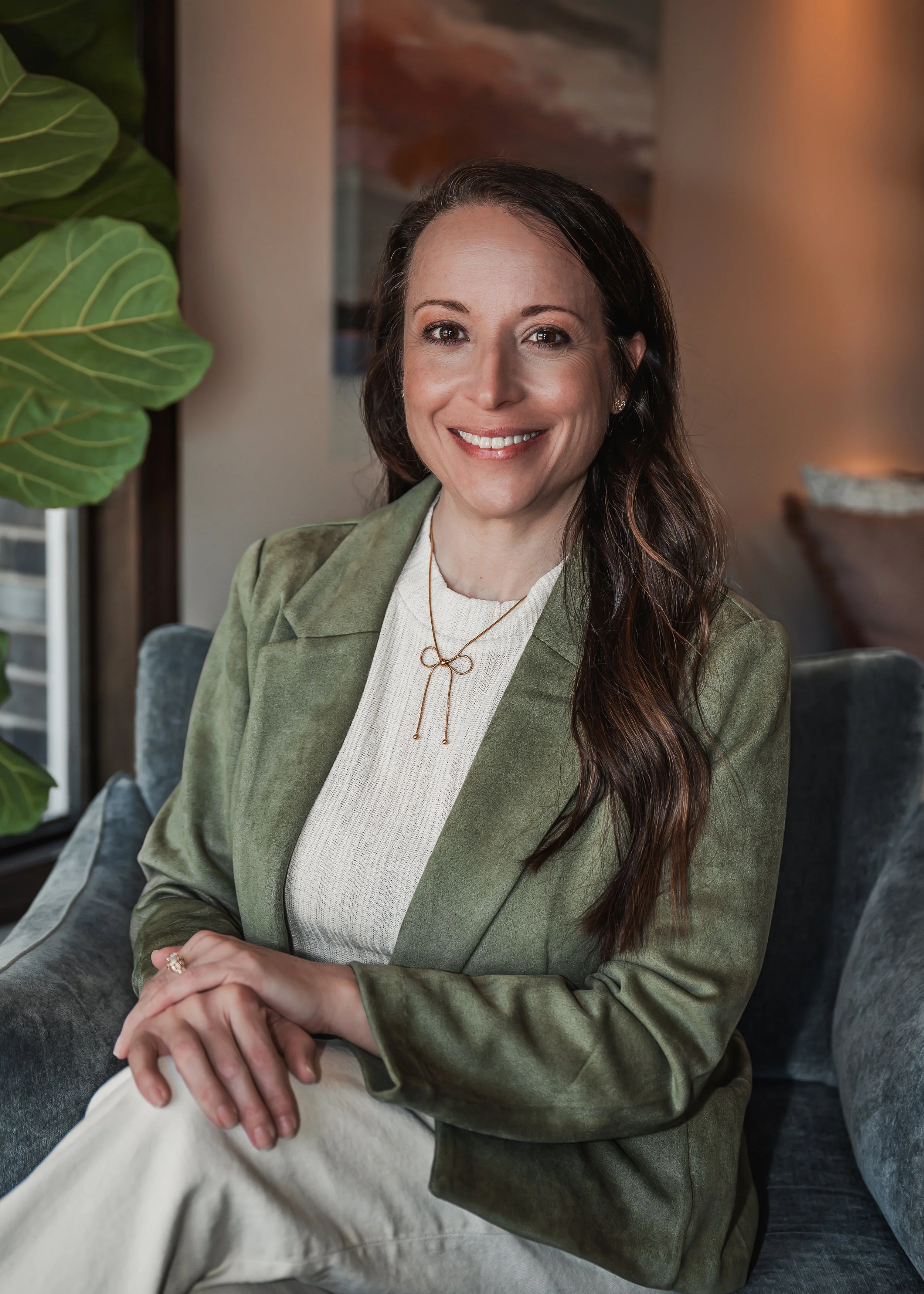 Jenny Wiggins, ALC, professional therapist in Huntsville, Alabama, smiling in a professional portrait for Evergreen Therapy