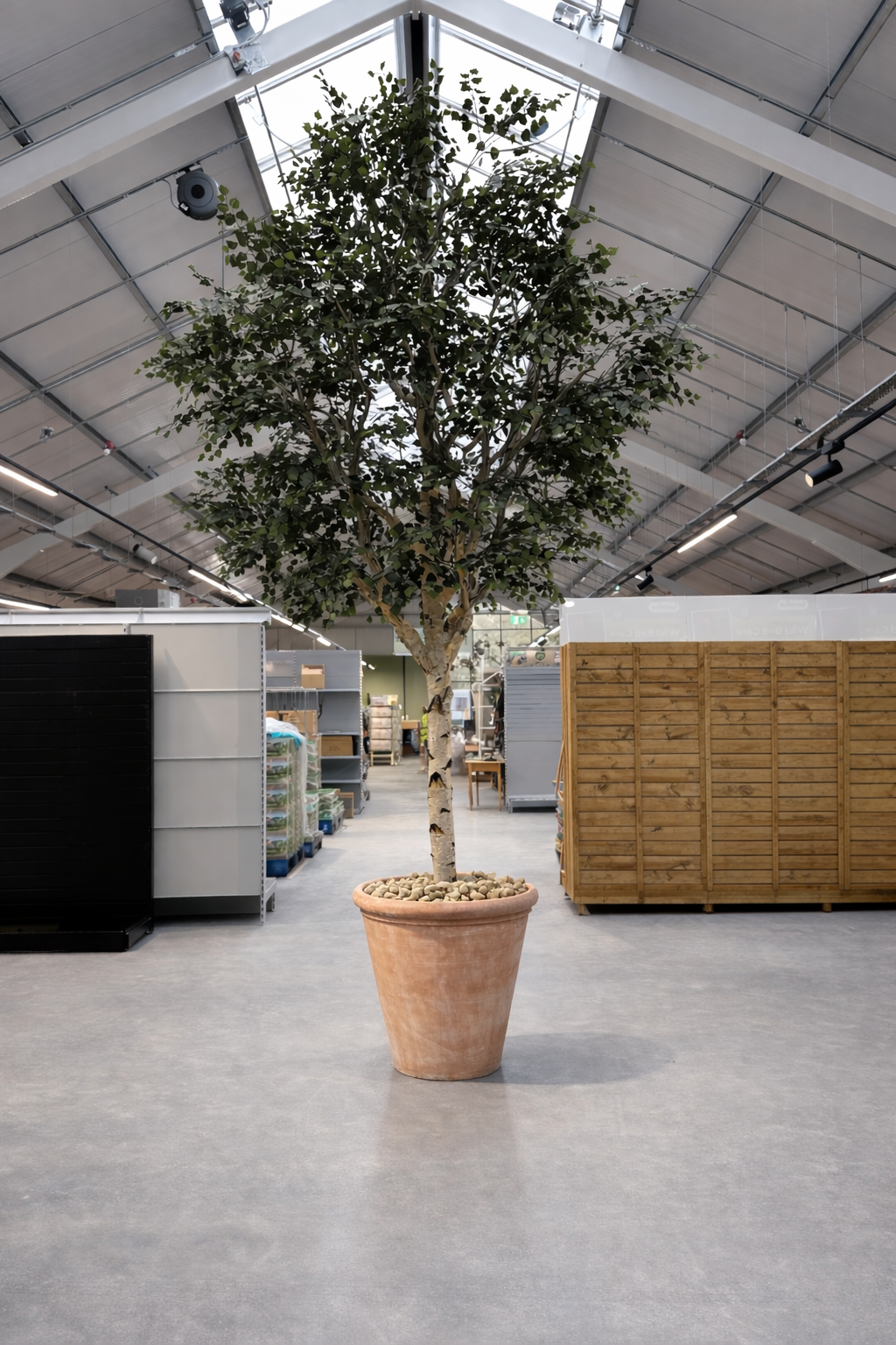 Artificial tree installation for commercial interior