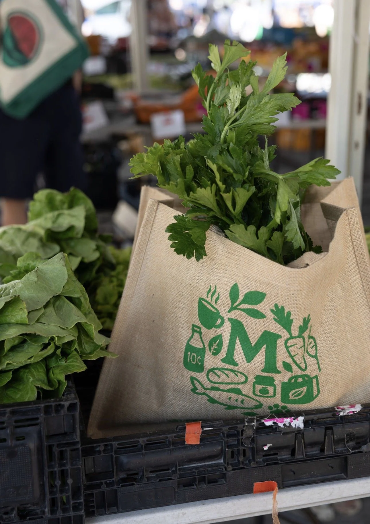 Fresh produce in a Manning Road Farmers Market tote bag