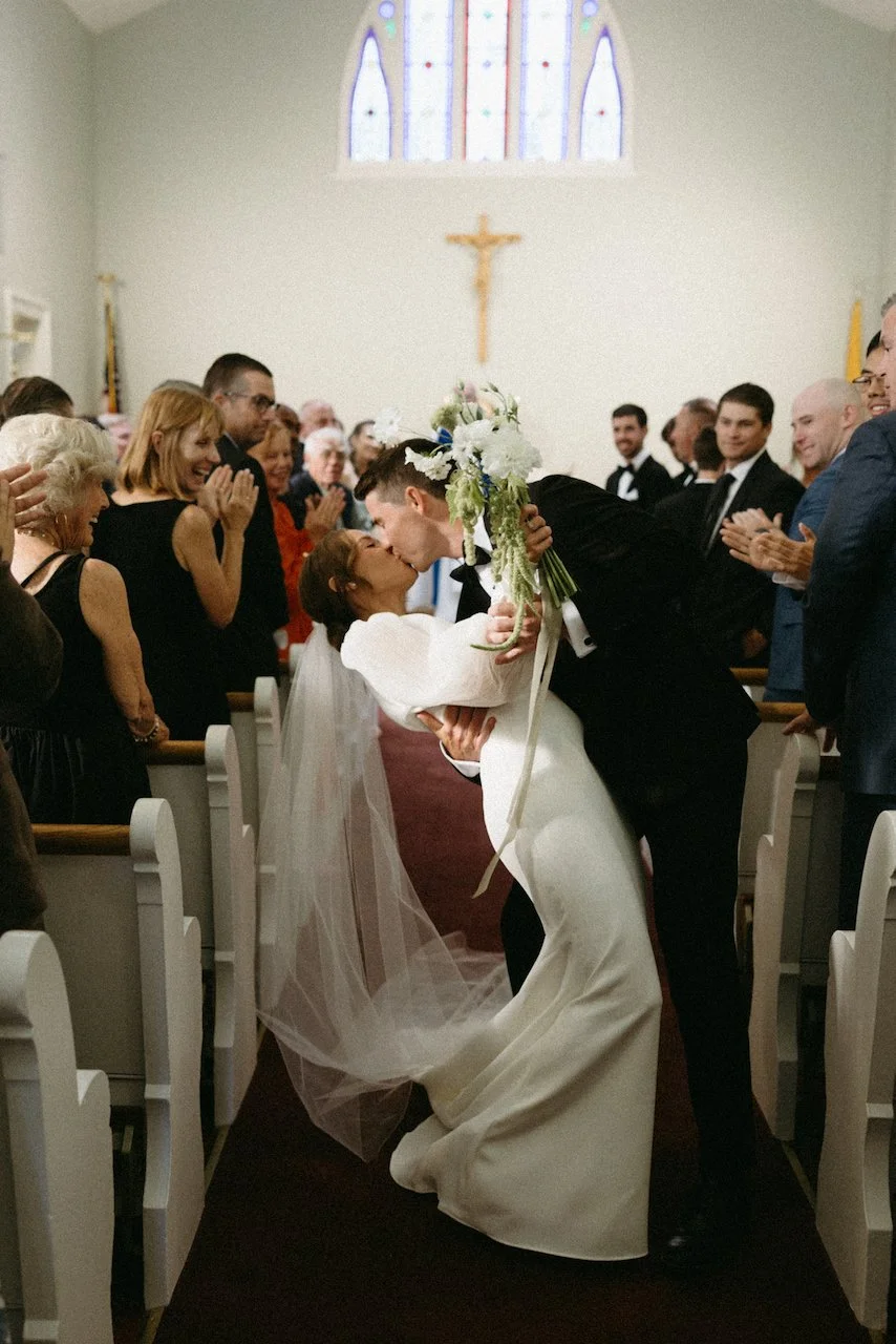 Ceremony Aisle Dip Kiss.jpeg