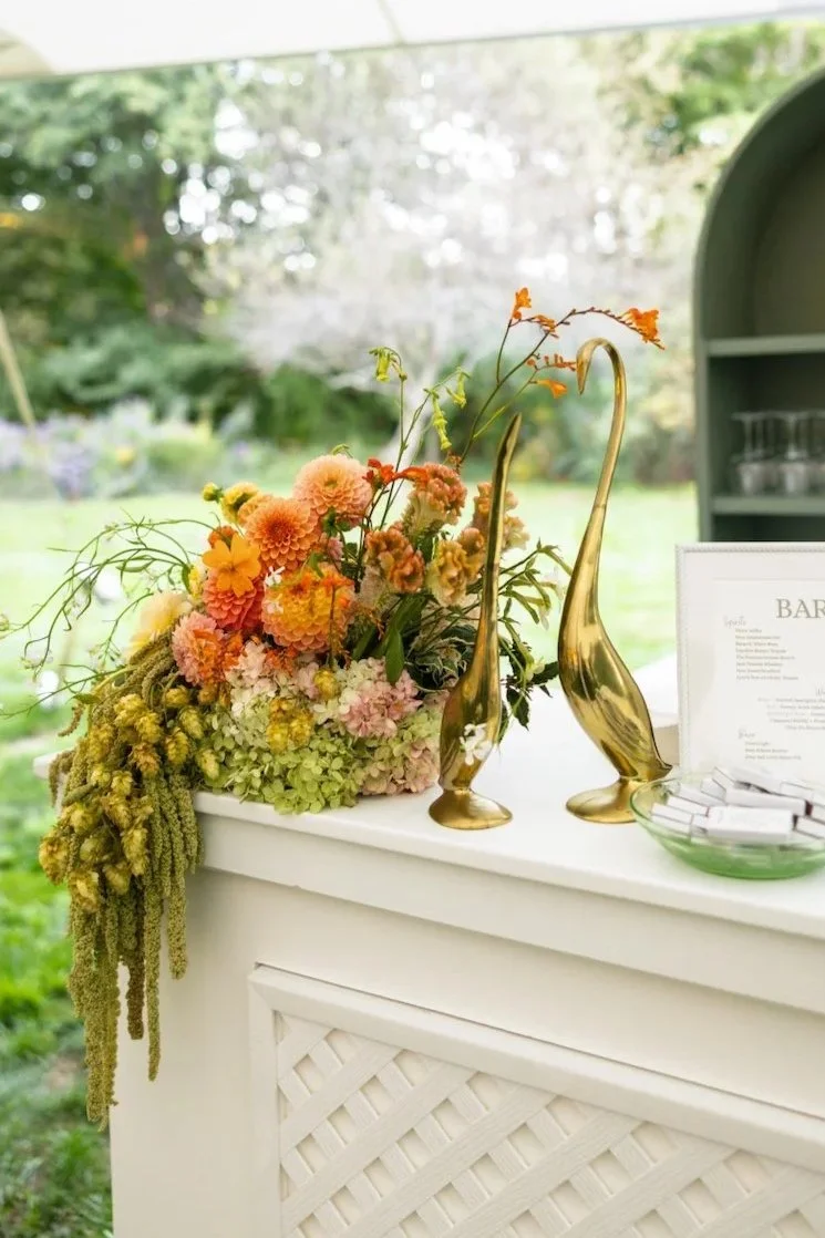 Connecticut Wedding Flowers in bold and vibrant colors and a sculptural style on a bar.