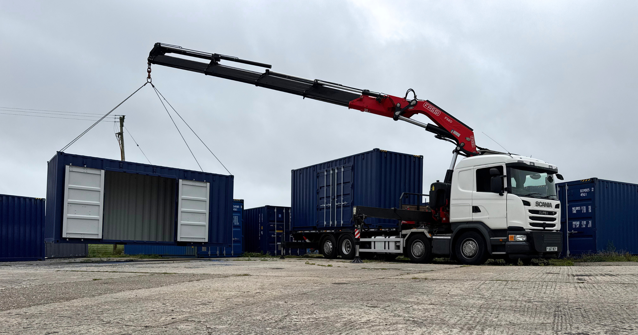 A 20ft container with cargo doors fitted to the side, to be delivered in Pembrokeshire.