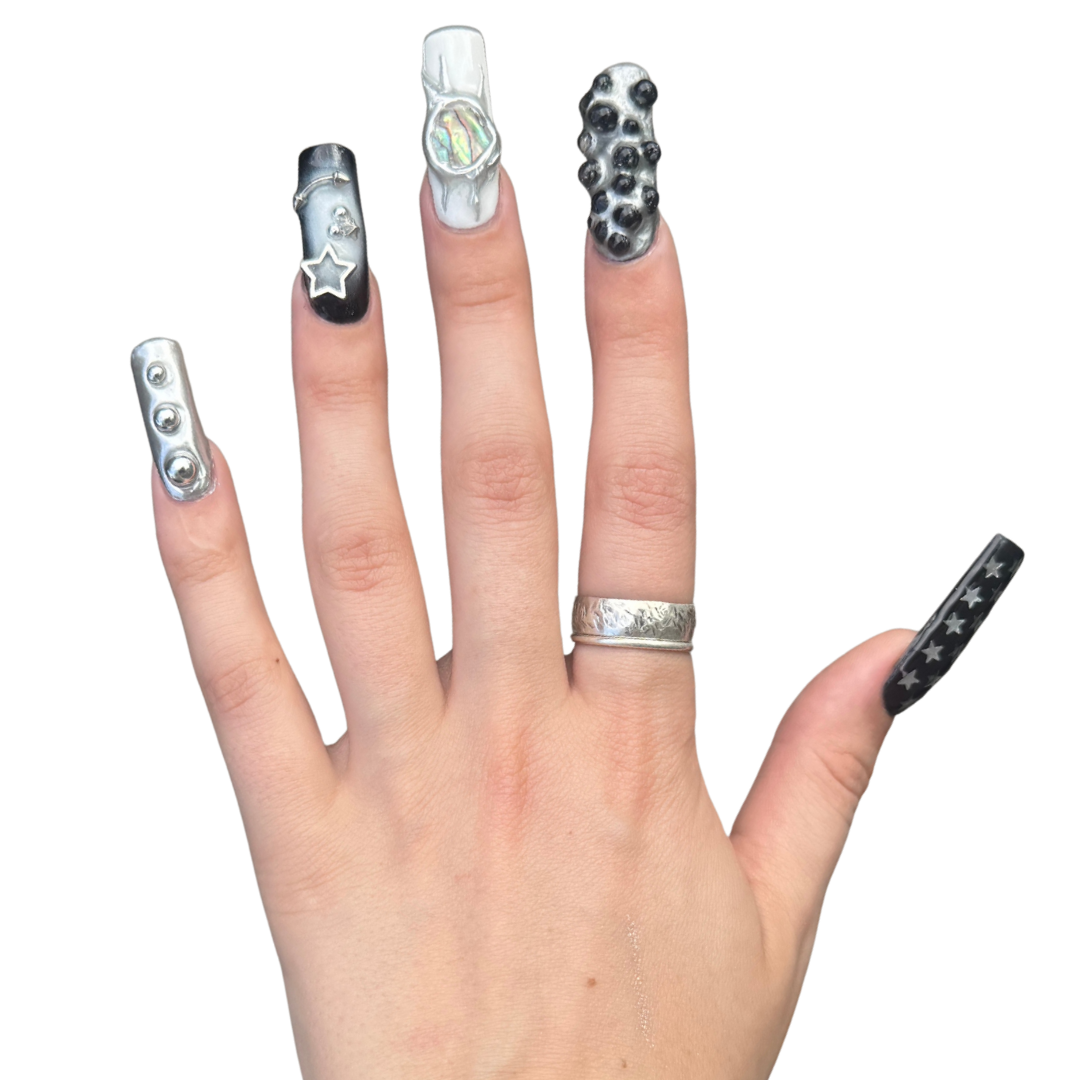 long square organic space alien creative themed nails with silver chrome stars clear abstract texture and opal shell balls