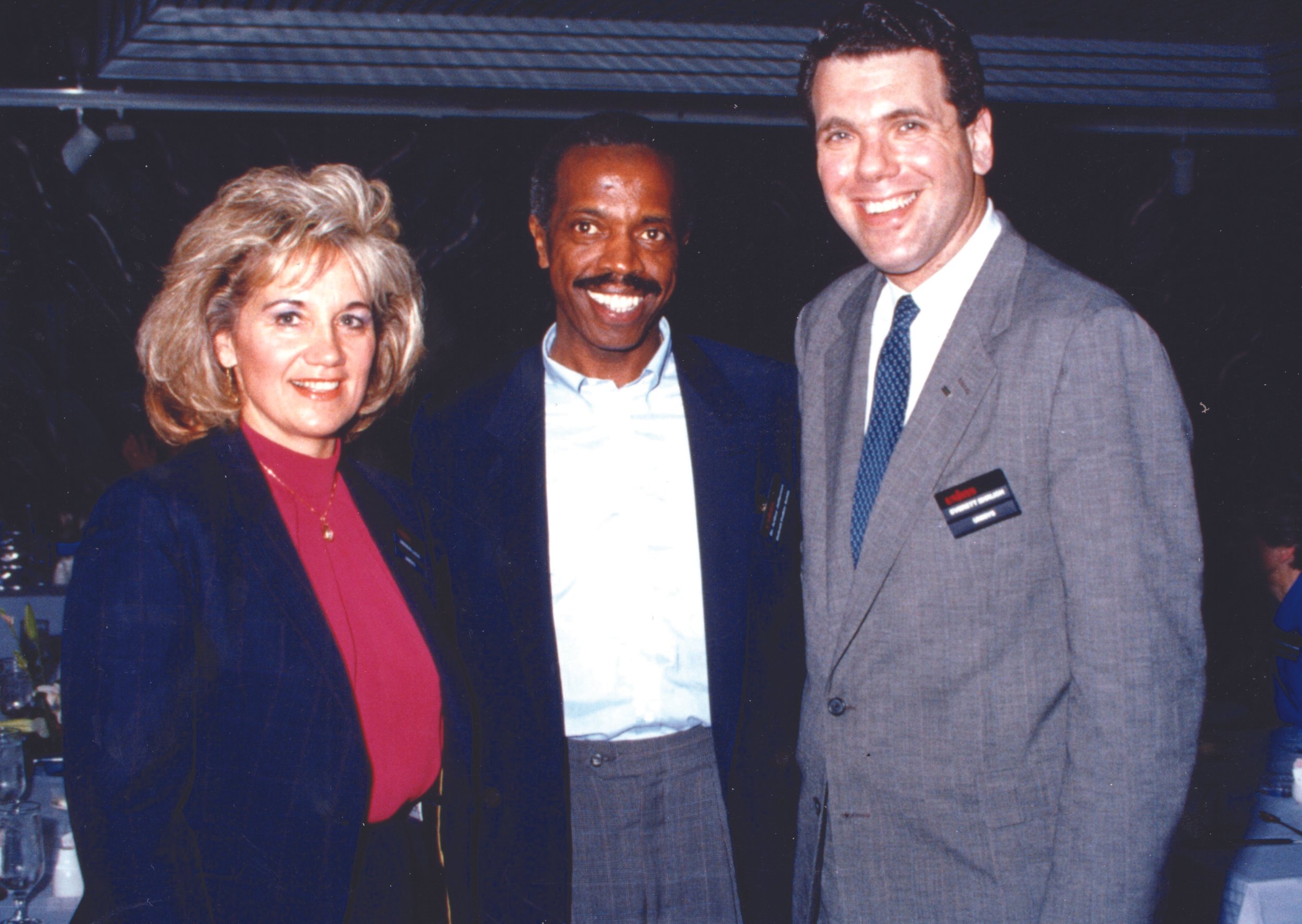 Dagnija with Dr. Arthur Jefferson, Superintendent of Detroit Public Schools (center) and a Unisys executive. 1980s