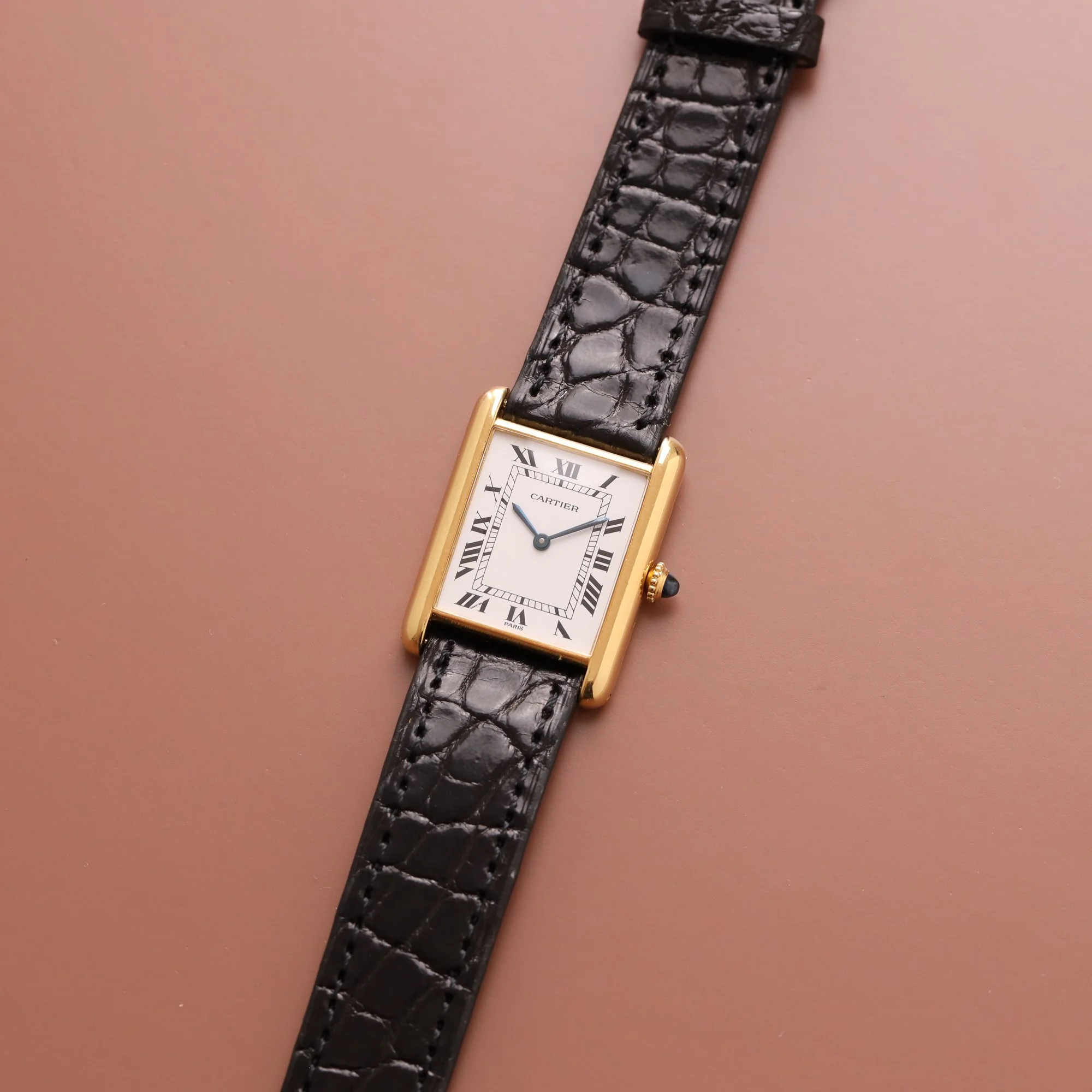 https://www.voystimeless.com/shop/p/1990s-mint-cartier-santos-galbe-18k-887901-or-massif-cream-dial.jpg