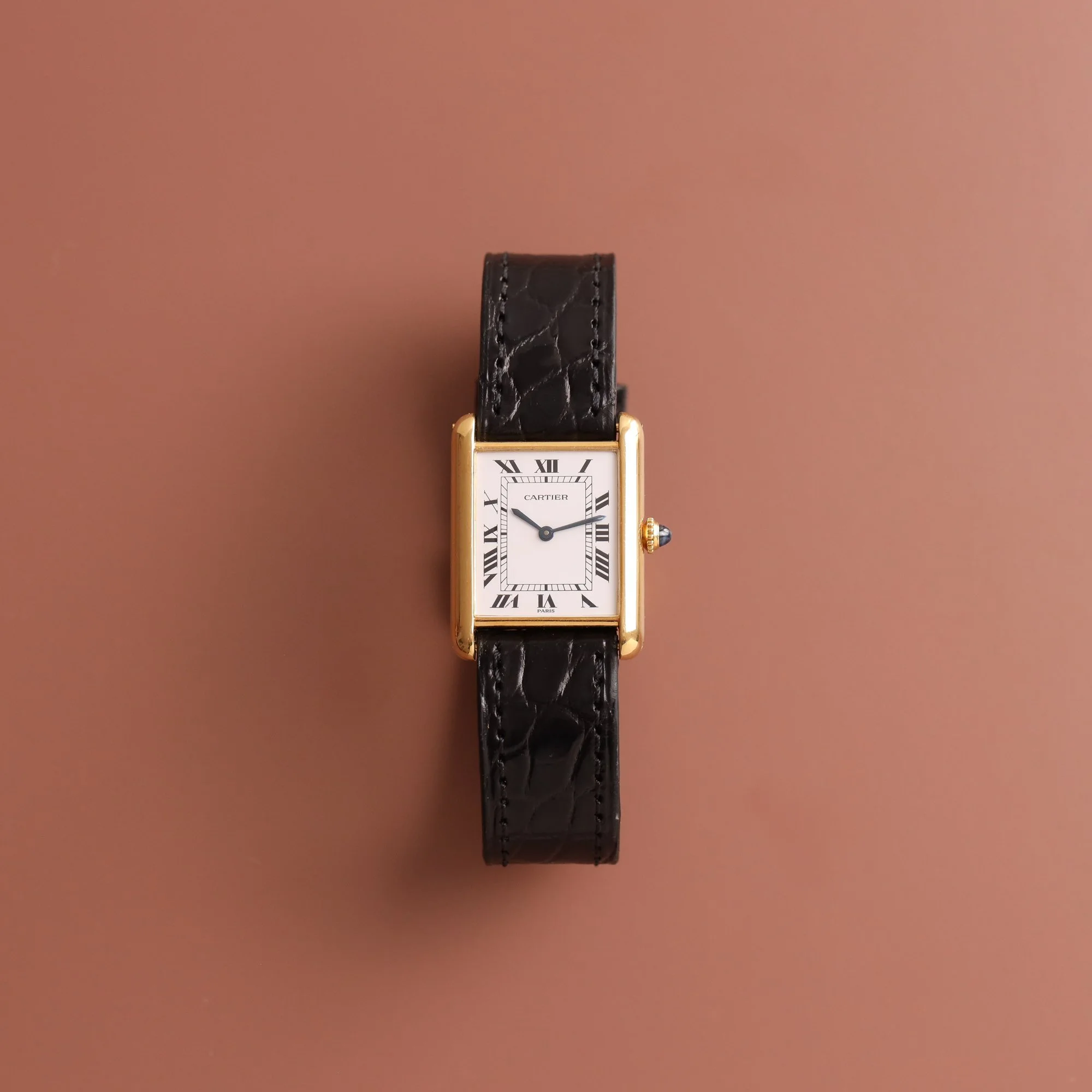 https://www.voystimeless.com/shop/p/1990s-mint-cartier-santos-galbe-18k-887901-or-massif-cream-dial.jpg