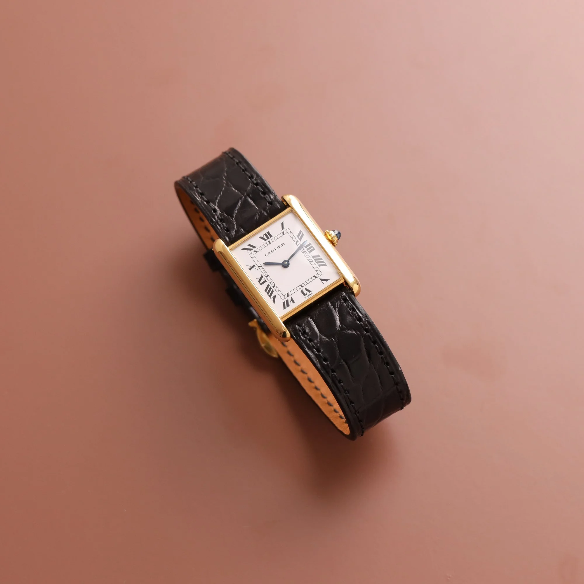 https://www.voystimeless.com/shop/p/1990s-mint-cartier-santos-galbe-18k-887901-or-massif-cream-dial.jpg