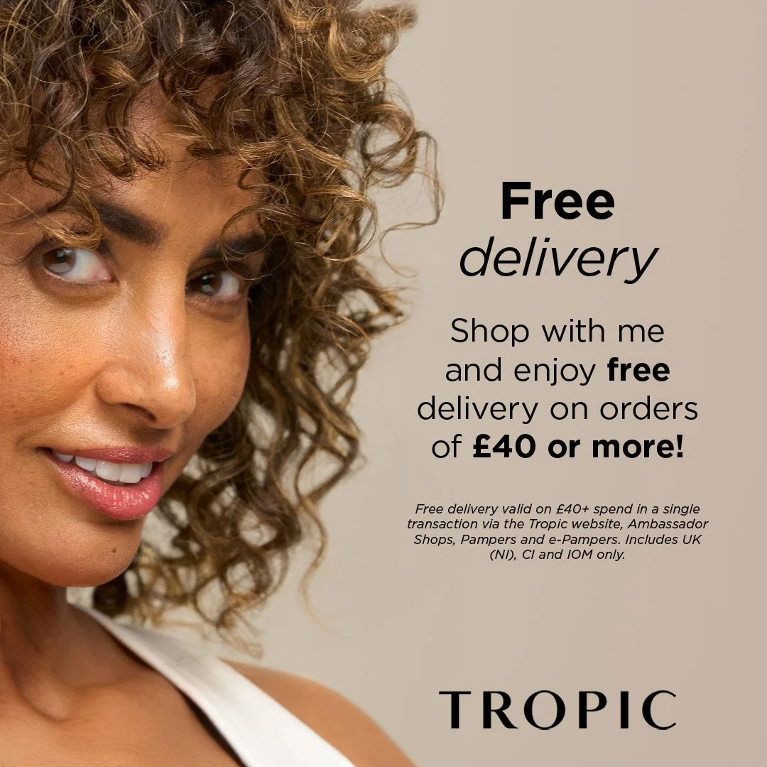 Close-up of a woman with curly brown hair smiling, alongside promotional text about free delivery on orders of £40 or more from Tropic.