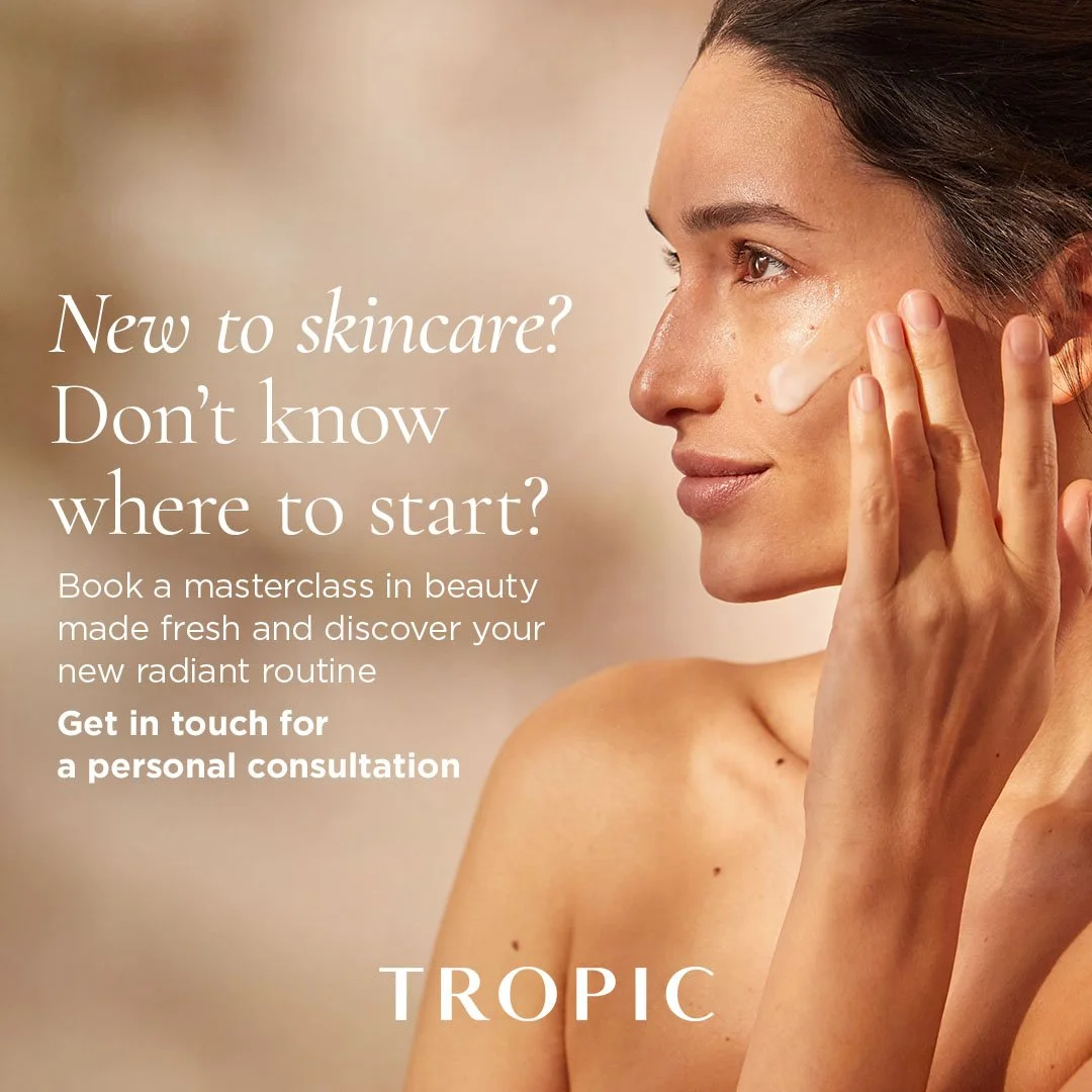 A woman applying skincare cream to her face with text advertising skincare masterclasses and personal consultations from Tropic.