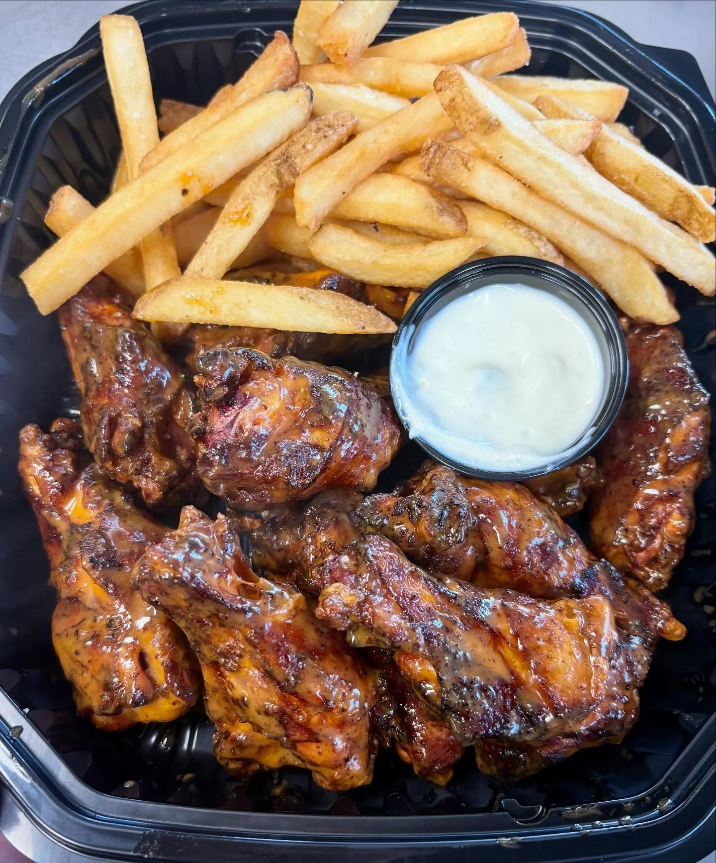 Our smoked wings are just the right amount of smokiness and crisp. 10 wings per order, buffalo or honey bbq $15

609-783-8567
Bettybbq.com