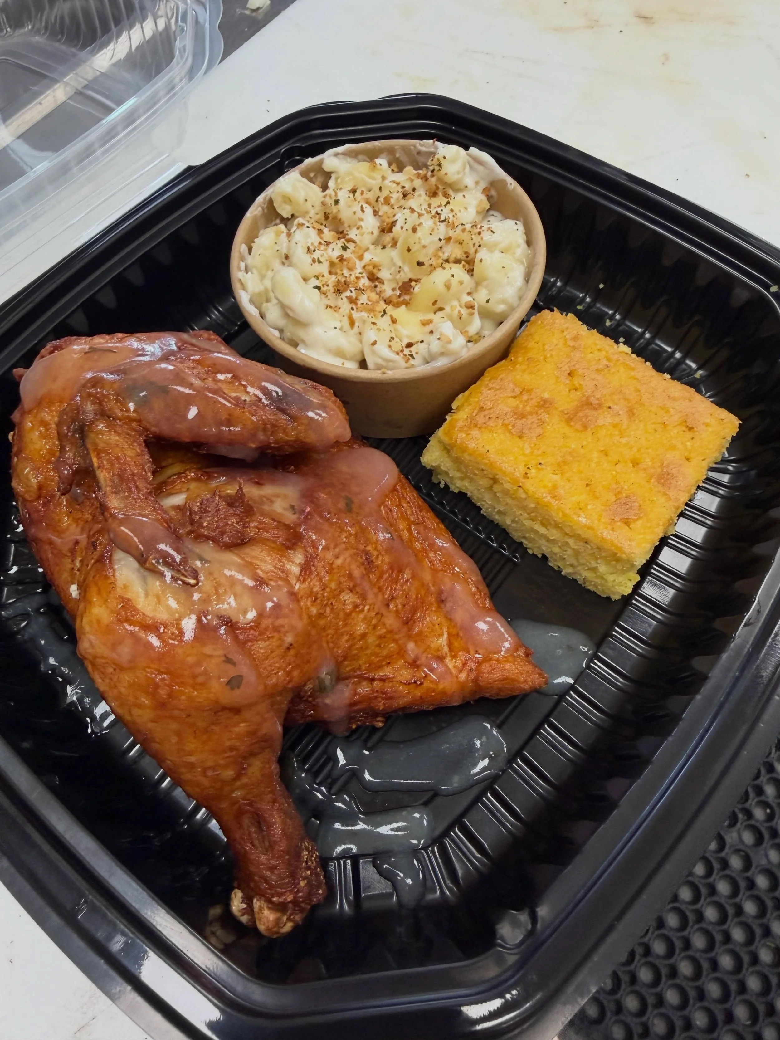 Our super-popular 1/2 Lemon Chicken. Cooked Sous vide style and then crisped-up and finished w Luis's Lemon Sauce. Folks LOVE its flavor and portion size. Comes w a side and our cornbread.  It's a nice non-smoked protein alternative that has really t