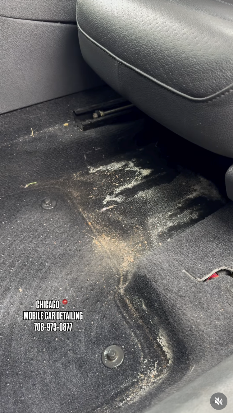 Dirty car floor with visible dirt and debris. Text overlay advertising Chicago mobile car detailing service with phone number.
