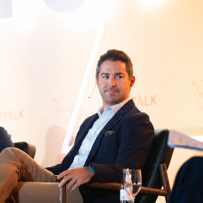 Jordan Rost speaking on a Shoptalk panel about how CTV helps brands inspire audiences and connect that inspiration to measurable action.