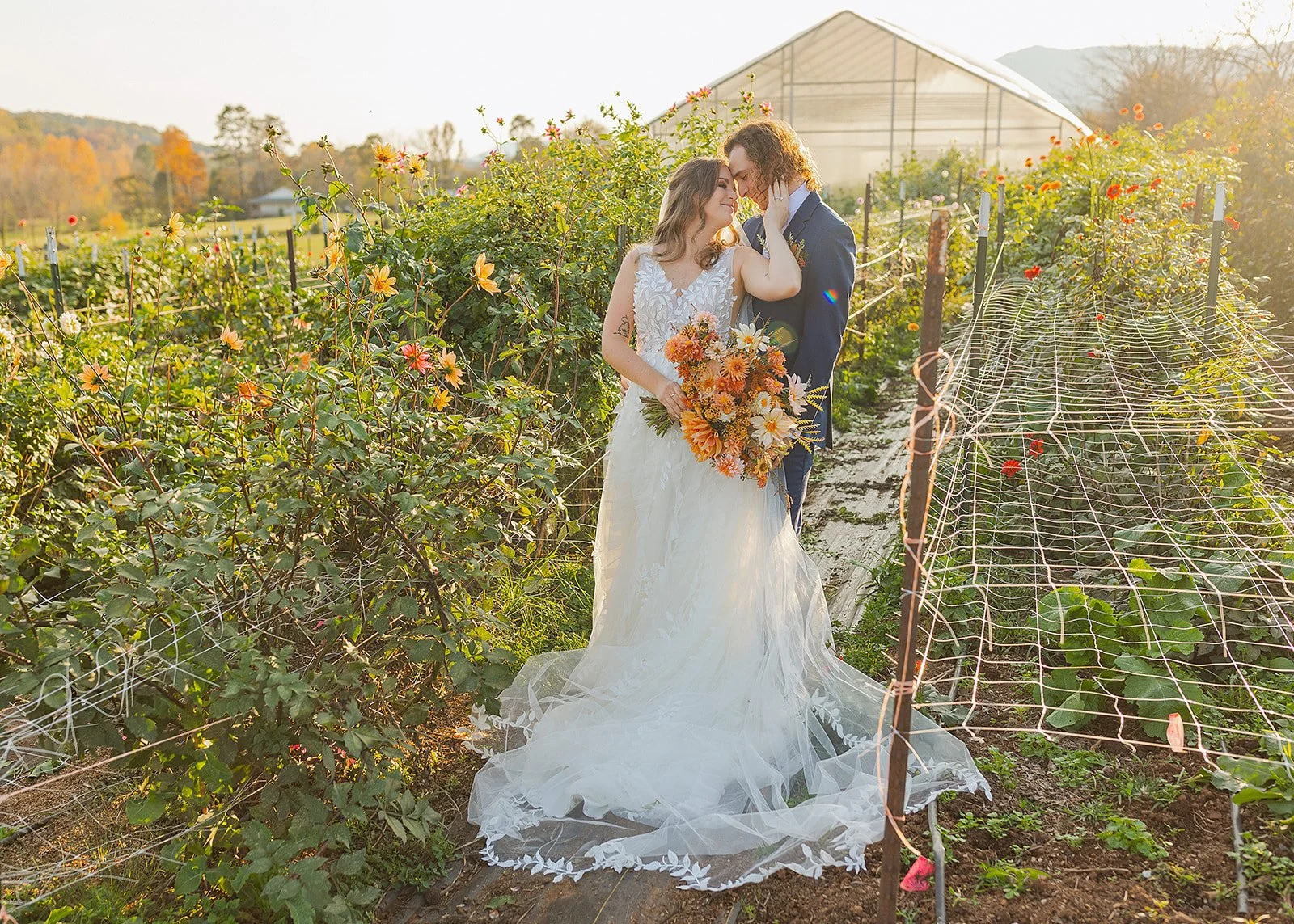 in the garden with greenhouse behind.jpg