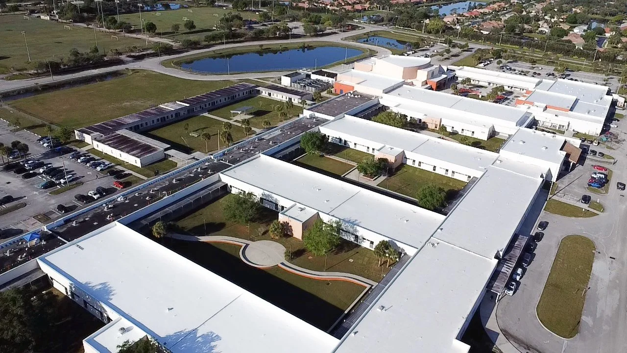 ST. LUCIE HIGH SCHOOL SILICONE COATING ROOF