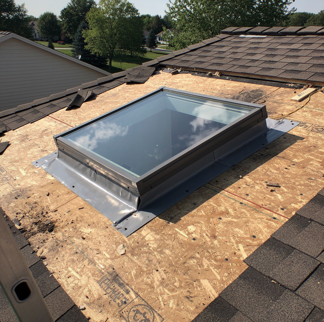 With Shingles Off, Should the Skylight Be Replaced?