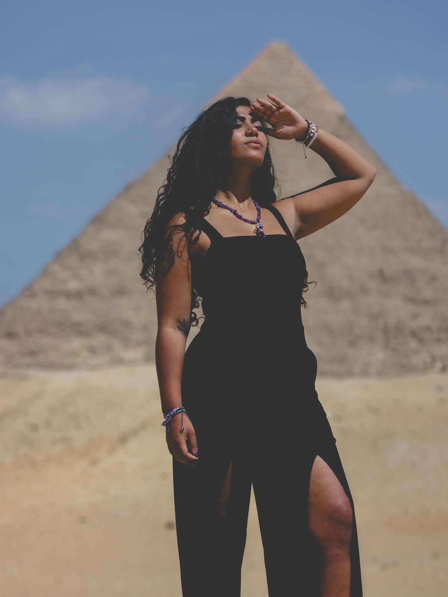 EGYPTIAN RAIN

Deities dwell in the ancient sands
Echoes of emperors ring throughout time
Underneath layers of royal matrimony,
Crowned kings carve a legacy for the future to behold.
With rare clouds over the mighty Sphinx,
The sky cries for those sh