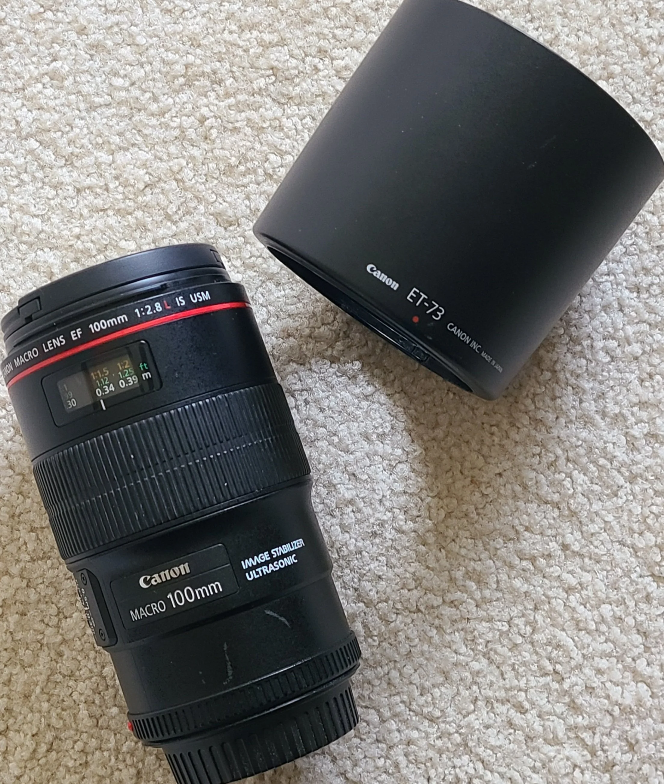 A Canon 100mm macro f2.8 L IS with lens hood