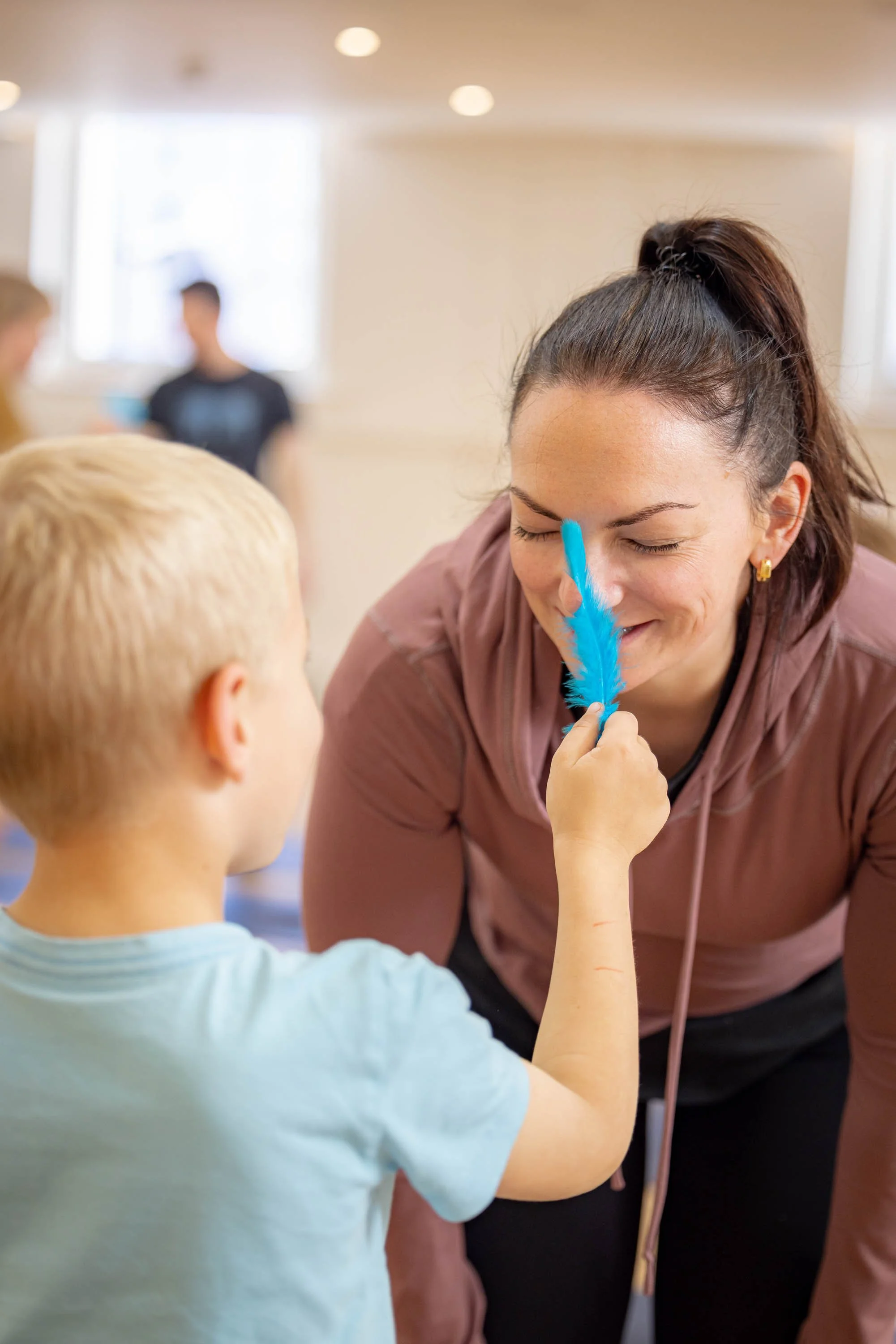 Mother and son doing yoga